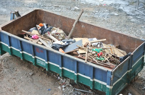 Professional garden clearance in Camden with tools and equipment