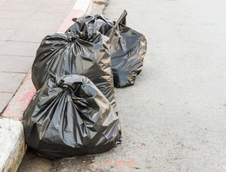 Happy residents with cleared space in Camden home